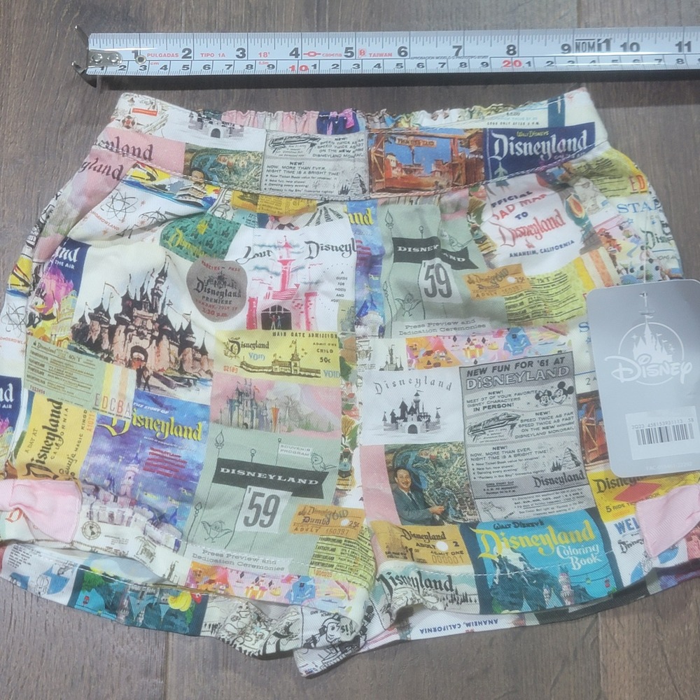 Disney 100 Vintage Disneyland Ticket Collage Shorts Girls Size 2 Pink Bows NEW